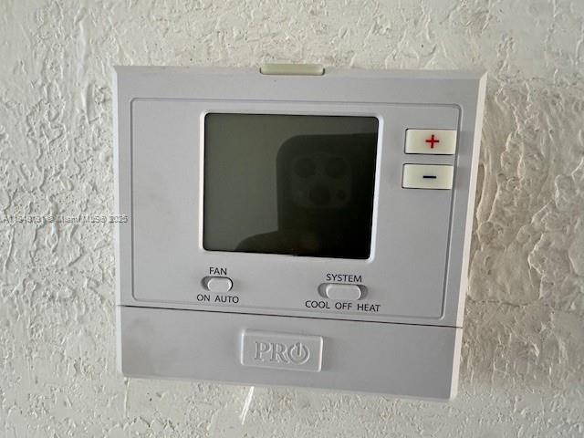 1850 Northeast 169th Street, Unit 308 North Miami Beach, FL 33162 - Photo 29 of 29 a bathroom with a sink and a mirror