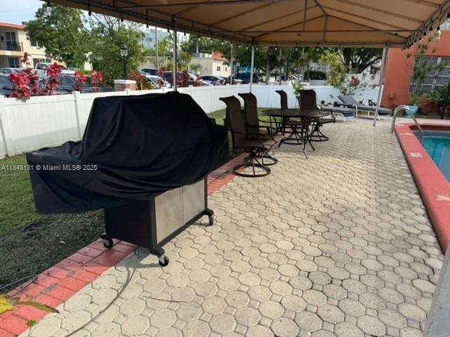 1850 Northeast 169th Street, Unit 308 North Miami Beach, FL 33162 - Photo 8 of 29 a view of outdoor space yard and patio