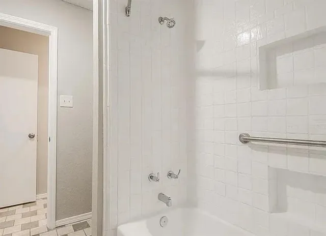 a bathroom with a bathtub