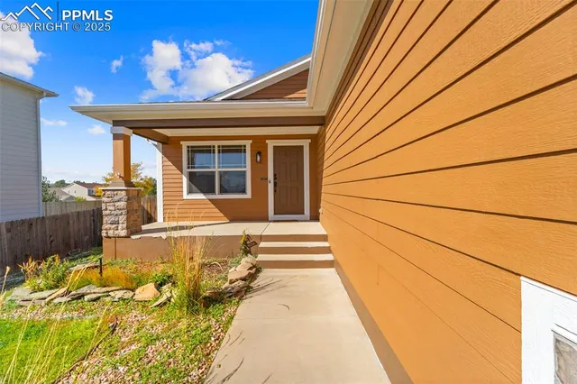a view of a patio with swimming pool
