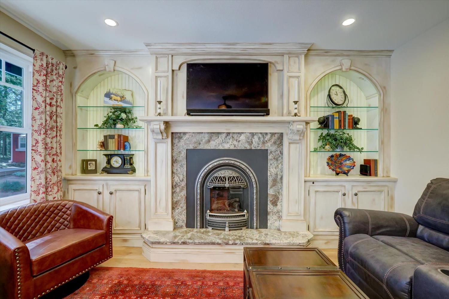 19793 Scotts Flat Road Nevada City, CA 95959 - Photo 12 of 50 a living room with furniture fireplace and flat screen tv