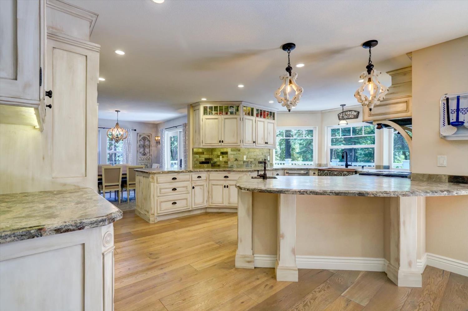 19793 Scotts Flat Road Nevada City, CA 95959 - Photo 15 of 50 a kitchen with stainless steel appliances granite countertop a stove and a sink