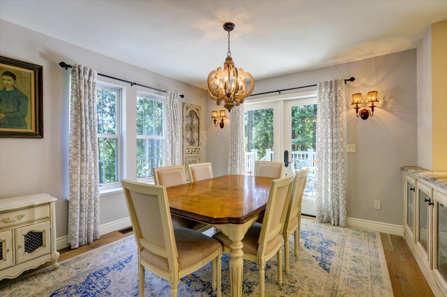 19793 Scotts Flat Road Nevada City, CA 95959 - Photo 16 of 50 a view of a dining room with furniture window and outside view