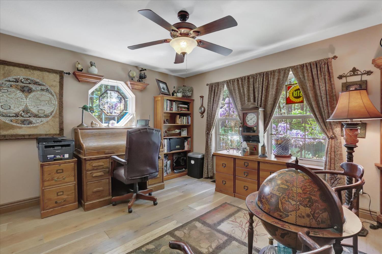 19793 Scotts Flat Road Nevada City, CA 95959 - Photo 20 of 50 a view of a workspace with furniture and a window