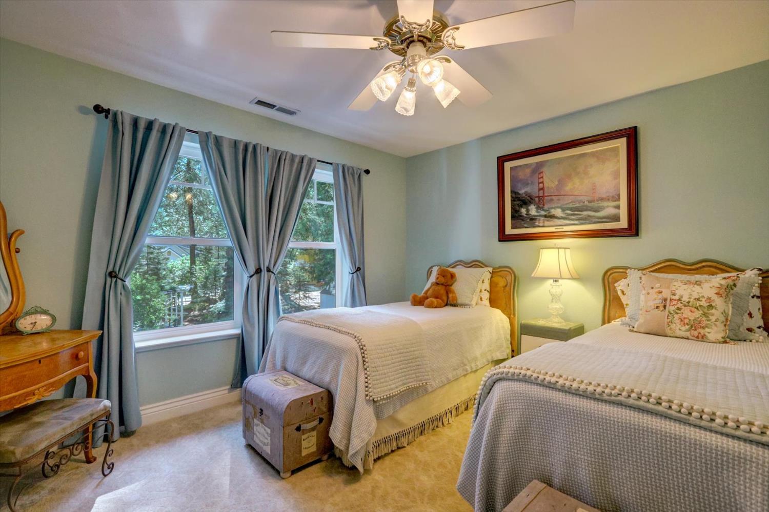 19793 Scotts Flat Road Nevada City, CA 95959 - Photo 31 of 50 a bedroom with two beds and a large window