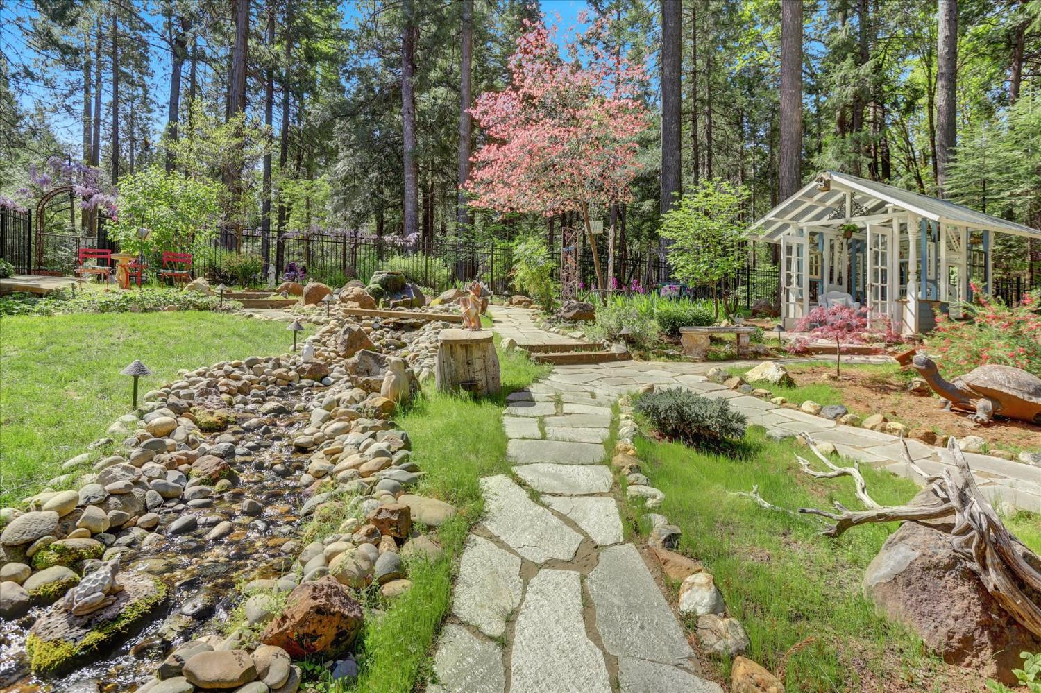 19793 Scotts Flat Road Nevada City, CA 95959 - Photo 36 of 50 a view of a house with a yard