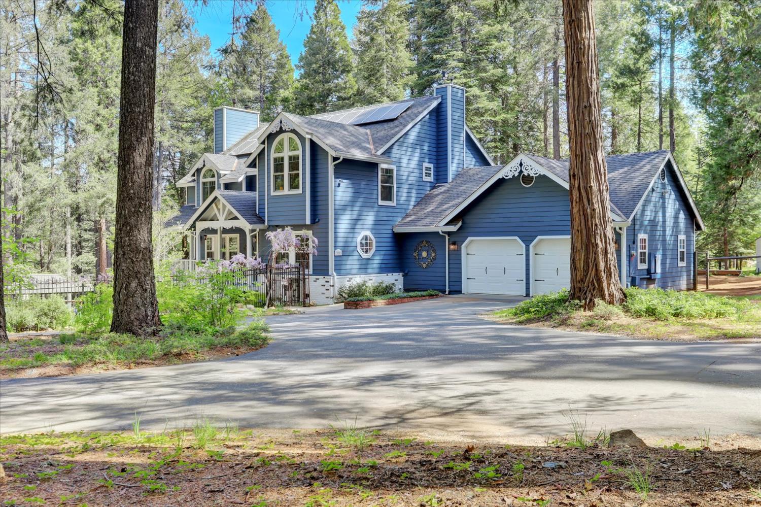 19793 Scotts Flat Road Nevada City, CA 95959 - Photo 44 of 50 a front view of a house with a yard and lake view