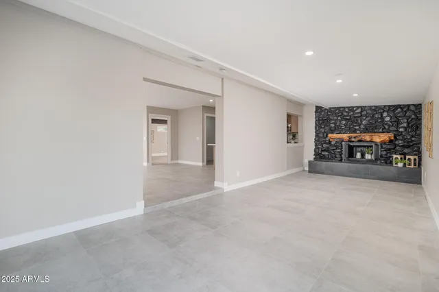 a view of a livingroom with a fireplace