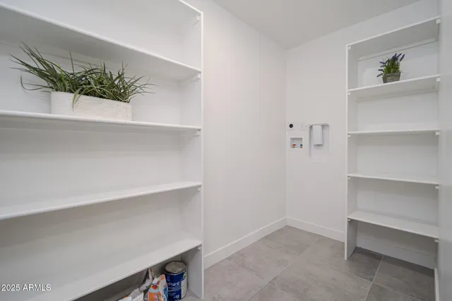 a view of room with cabinets