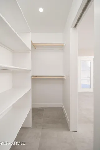 a view of an empty walk in closet