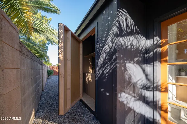a view of a house with a tree