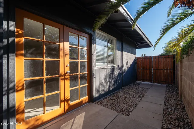 a view of a backyard of a house