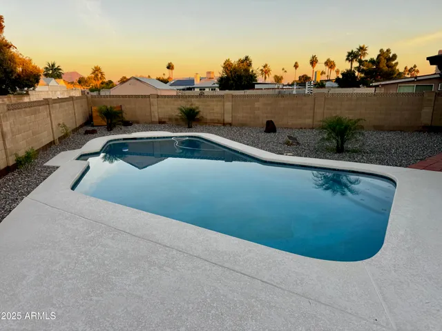 a view of a swimming pool and a terrace
