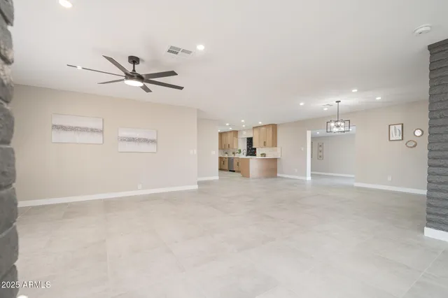 a view of a livingroom with a ceiling fan