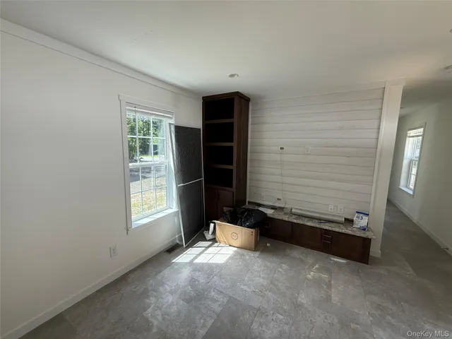a bathroom with a toilet a sink and bathtub