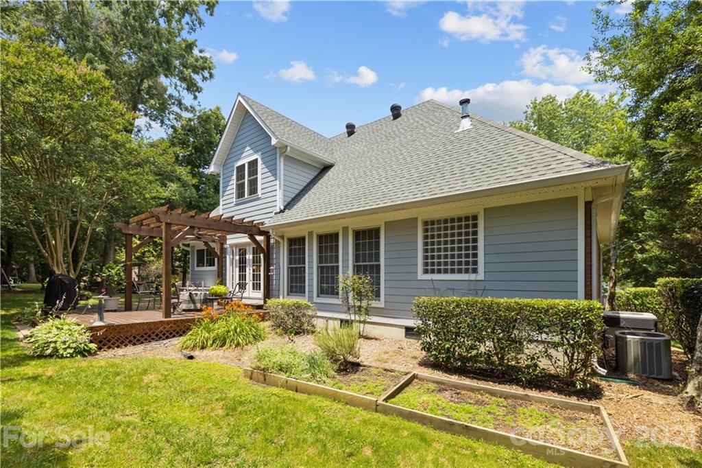 348 Gringley Hill Road Fort Mill, SC 29708 - Photo 11 of 33 a view of a house with swimming pool and sitting area