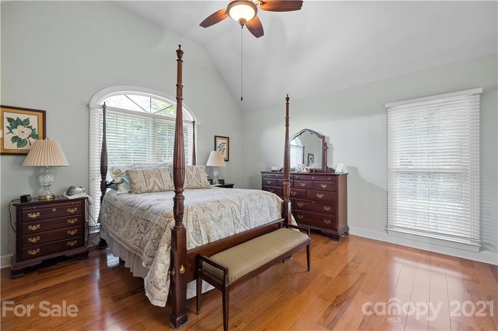 348 Gringley Hill Road Fort Mill, SC 29708 - Photo 22 of 33 a bedroom with a bed dresser and a window