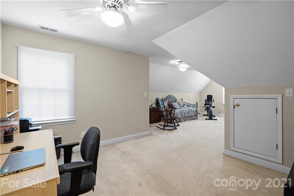 348 Gringley Hill Road Fort Mill, SC 29708 - Photo 25 of 33 a view of a room with furniture and a window