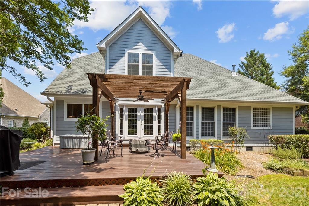 348 Gringley Hill Road Fort Mill, SC 29708 - Photo 10 of 33 a front view of a house with swimming pool and porch