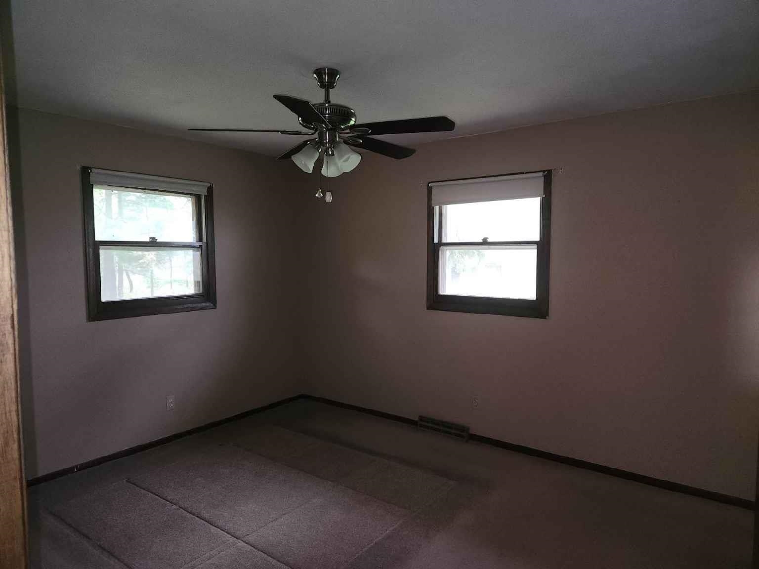 1281 Spring Center Road Belvidere, IL 61008 - Photo 14 of 19 wooden floor in an empty room with a window