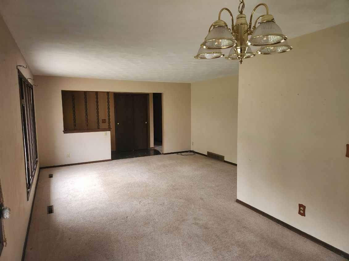 1281 Spring Center Road Belvidere, IL 61008 - Photo 7 of 19 an empty room with a empty space