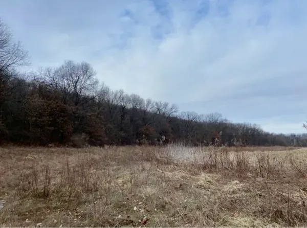 a view of lake with mountain