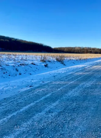 a view of ocean with sunset