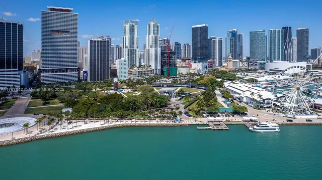 a view of a city with tall buildings