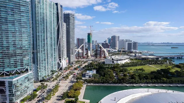 a view of a city with tall buildings
