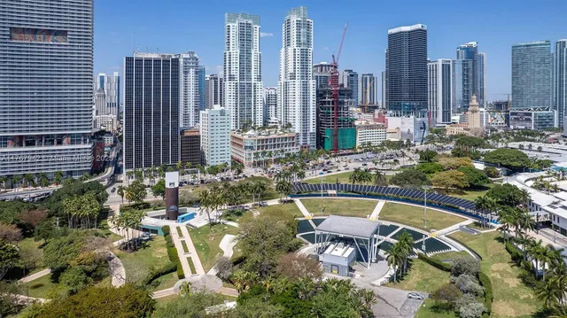 a view of a city with tall buildings