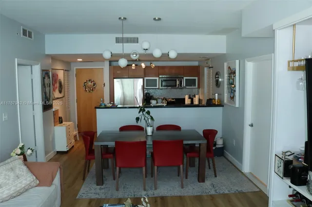 a view of a dining room with furniture