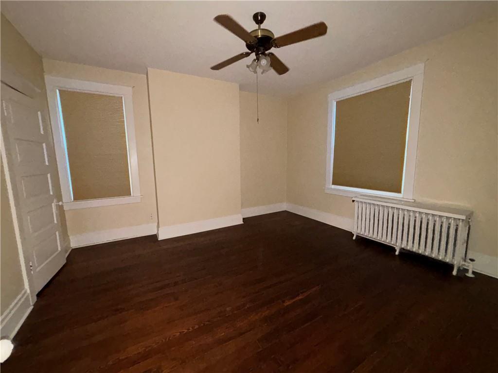 501 Atlantic Avenue Monaca, PA 15061 - Photo 23 of 29 a view of an empty room with wooden floor and a window
