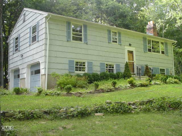 10 Old Lantern Road Danbury, CT 06810 - Photo 1 of 1 a front view of a house with a yard