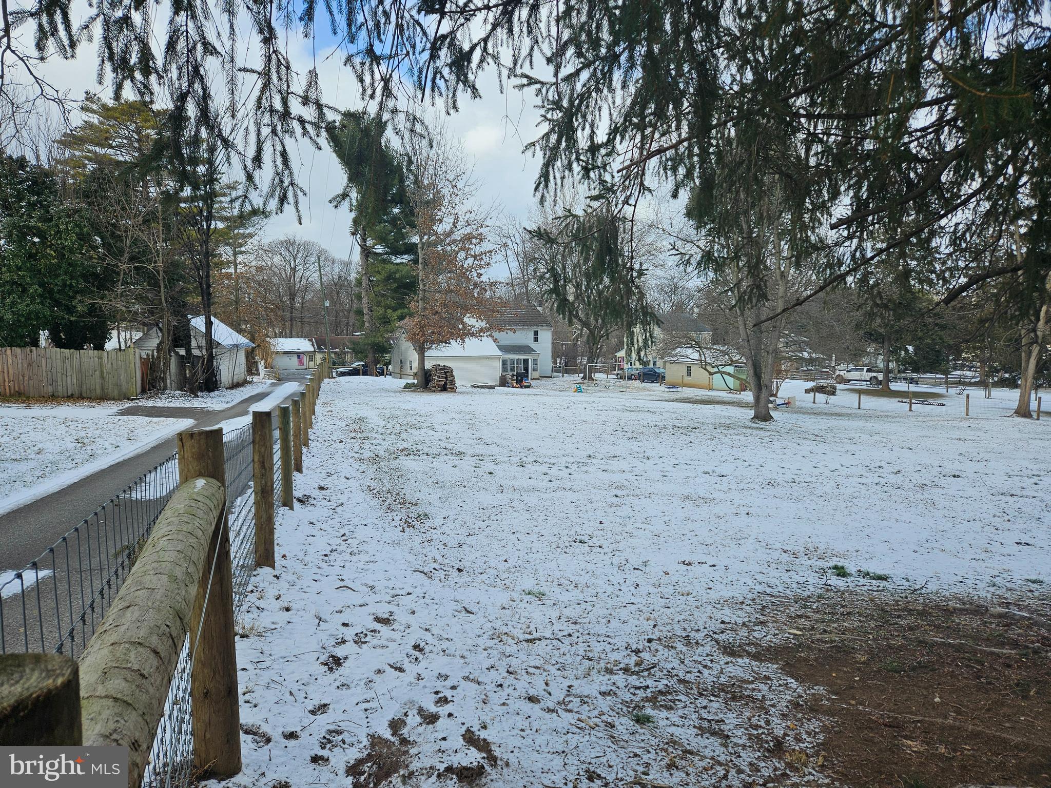 38 Coldspring Road Fayetteville, PA 17222 - Photo 16 of 17 a view of a backyard with wooden fence and large trees