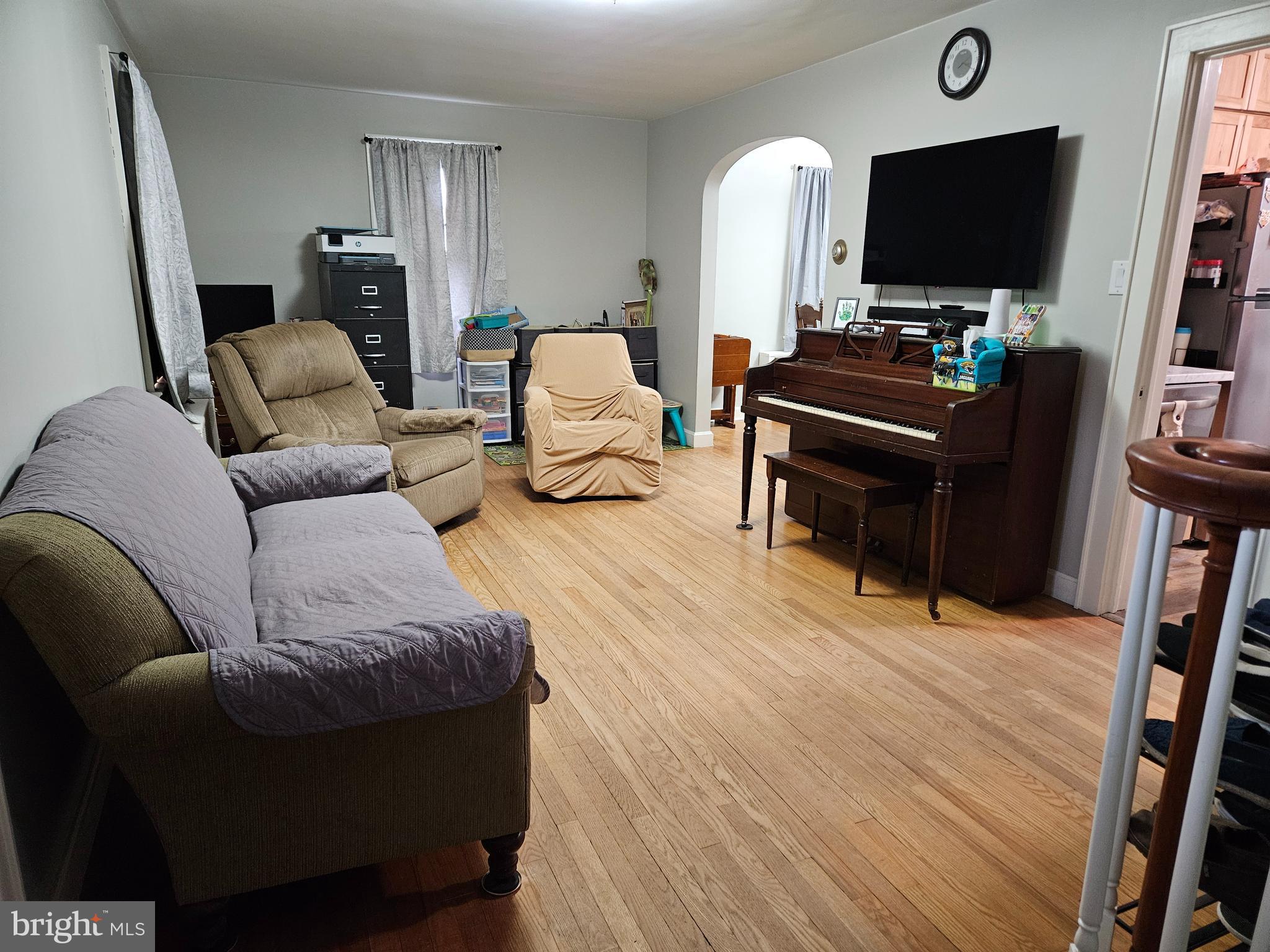 38 Coldspring Road Fayetteville, PA 17222 - Photo 5 of 17 a living room with furniture and a flat screen tv