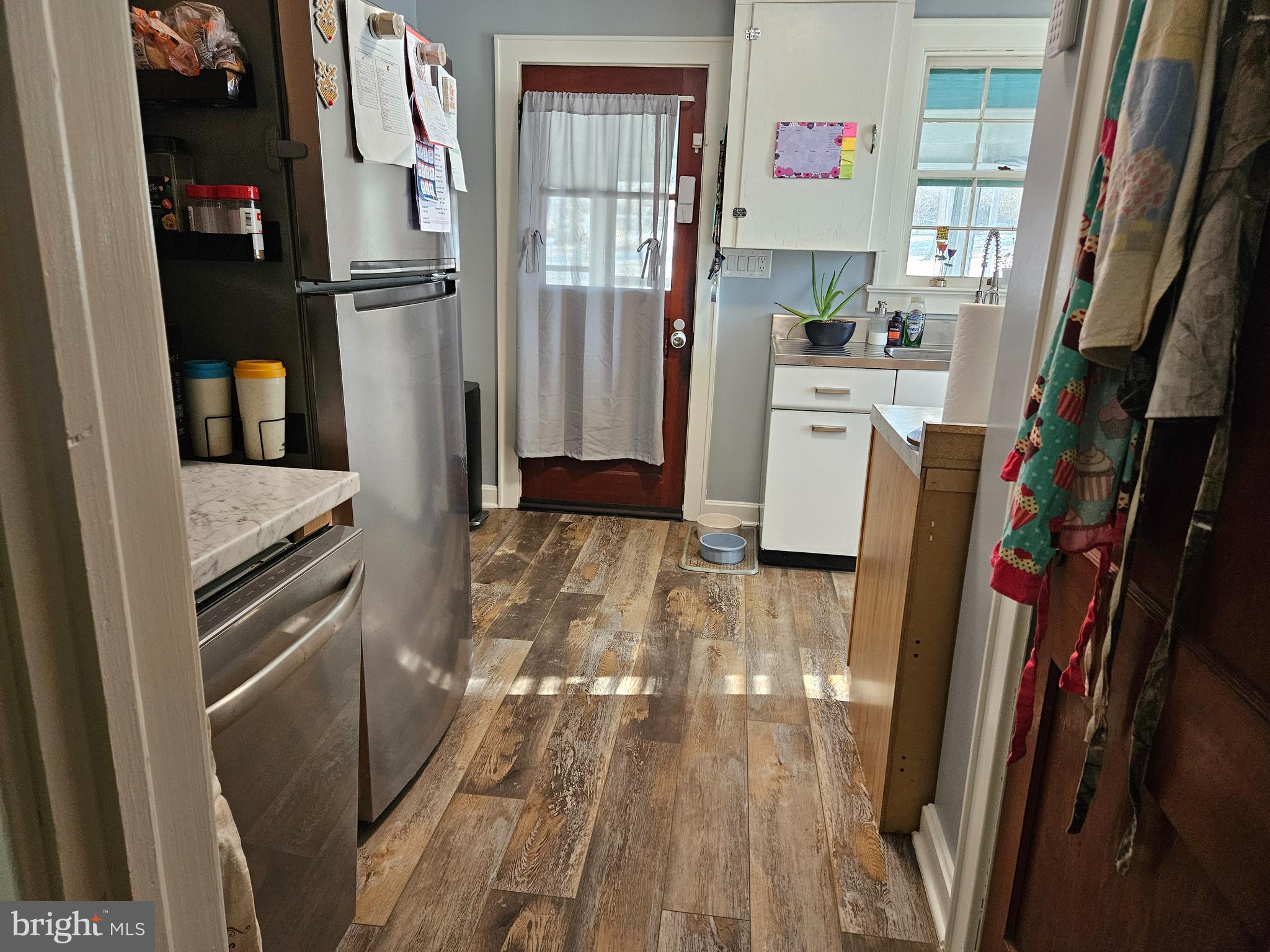 38 Coldspring Road Fayetteville, PA 17222 - Photo 7 of 17 a kitchen with white cabinets and refrigerator