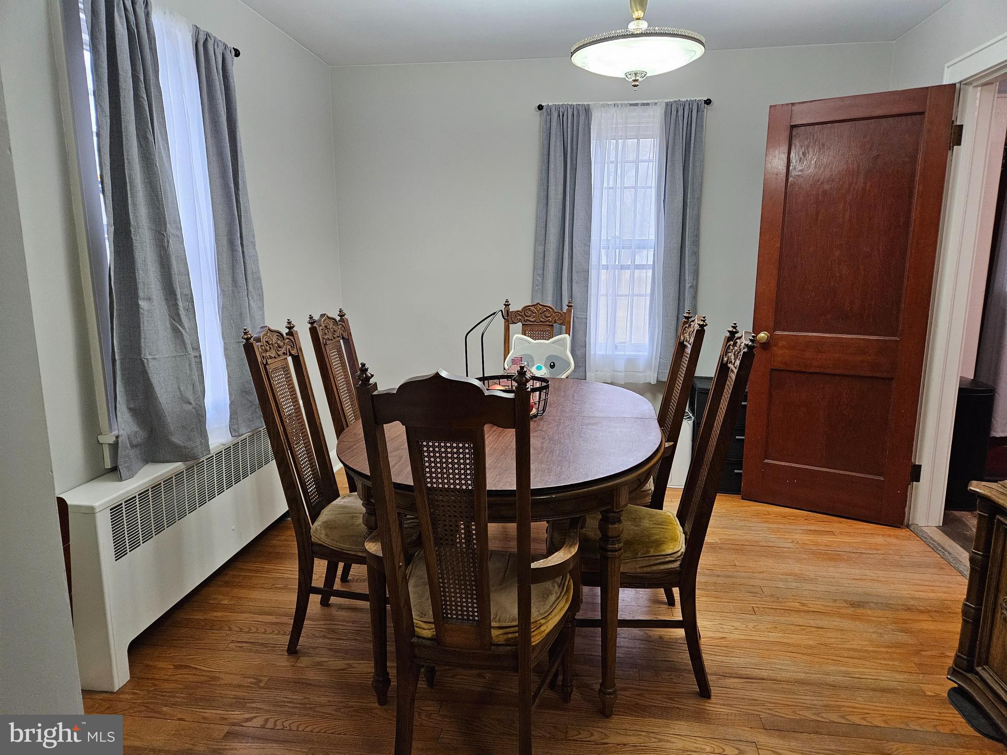 38 Coldspring Road Fayetteville, PA 17222 - Photo 8 of 17 a view of a dining room with furniture and wooden floor