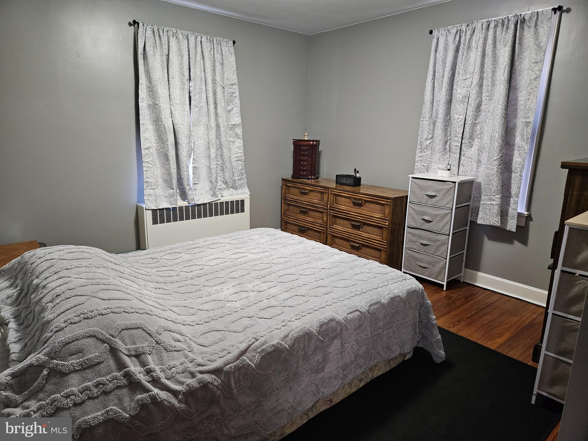 38 Coldspring Road Fayetteville, PA 17222 - Photo 10 of 17 a bedroom with a bed and wooden floor