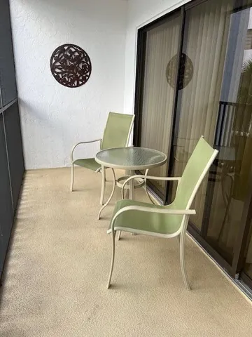 a view of a swimming pool with an outdoor space