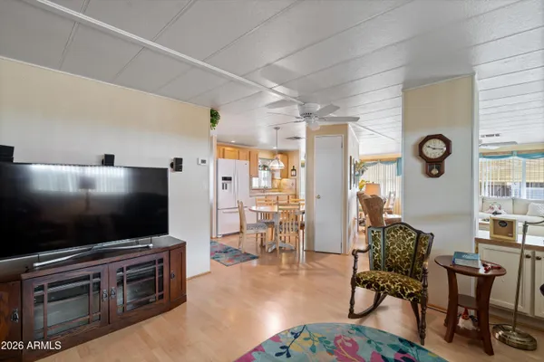 a kitchen with stainless steel appliances a stove a refrigerator and island