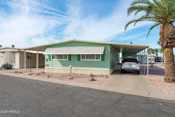 a view of a car in front of house