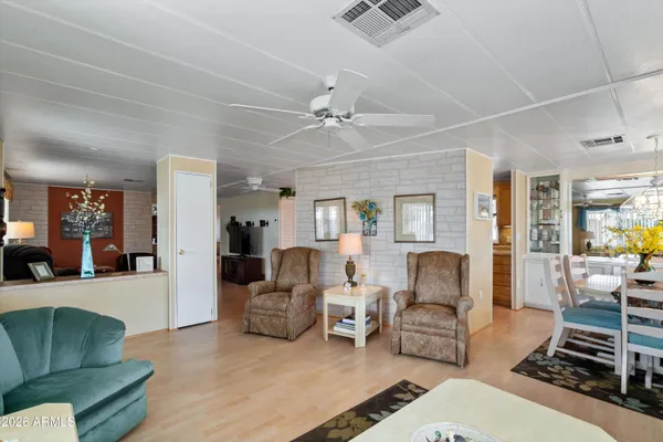 a living room with furniture and a table