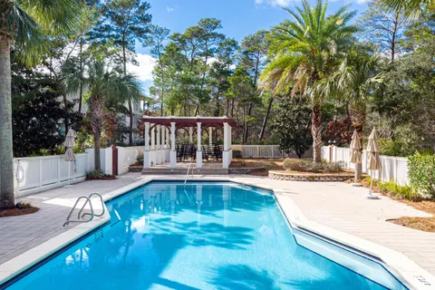 a view of a swimming pool with a patio