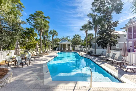 a view of a patio with swimming pool