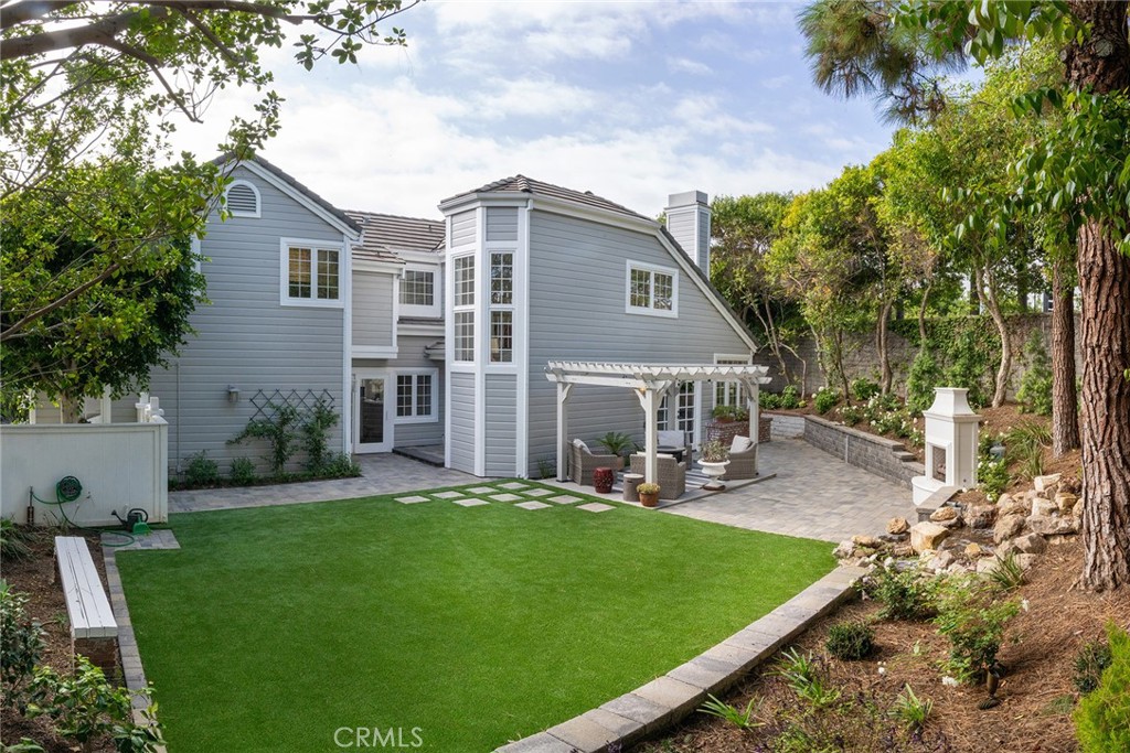 22 Chelsea Dana Point, CA 92629 - Photo 25 of 40 a view of a house with a yard and sitting area