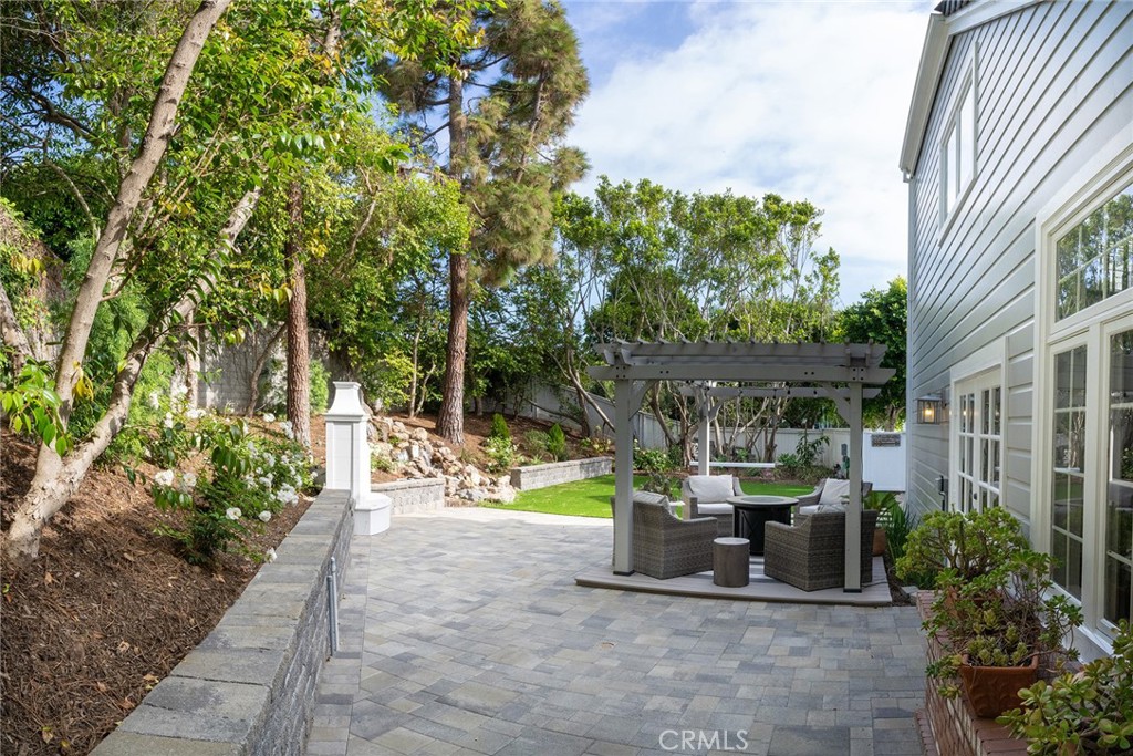 22 Chelsea Dana Point, CA 92629 - Photo 31 of 40 a view of a patio with table and chairs and potted plants
