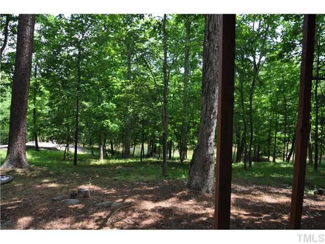 5409 Edington Lane Raleigh, NC 27604 - Photo 21 of 22 As you enjoy the nature of this property, you'll have to remind yourself you are just minutes from every city convenience! Back Yard