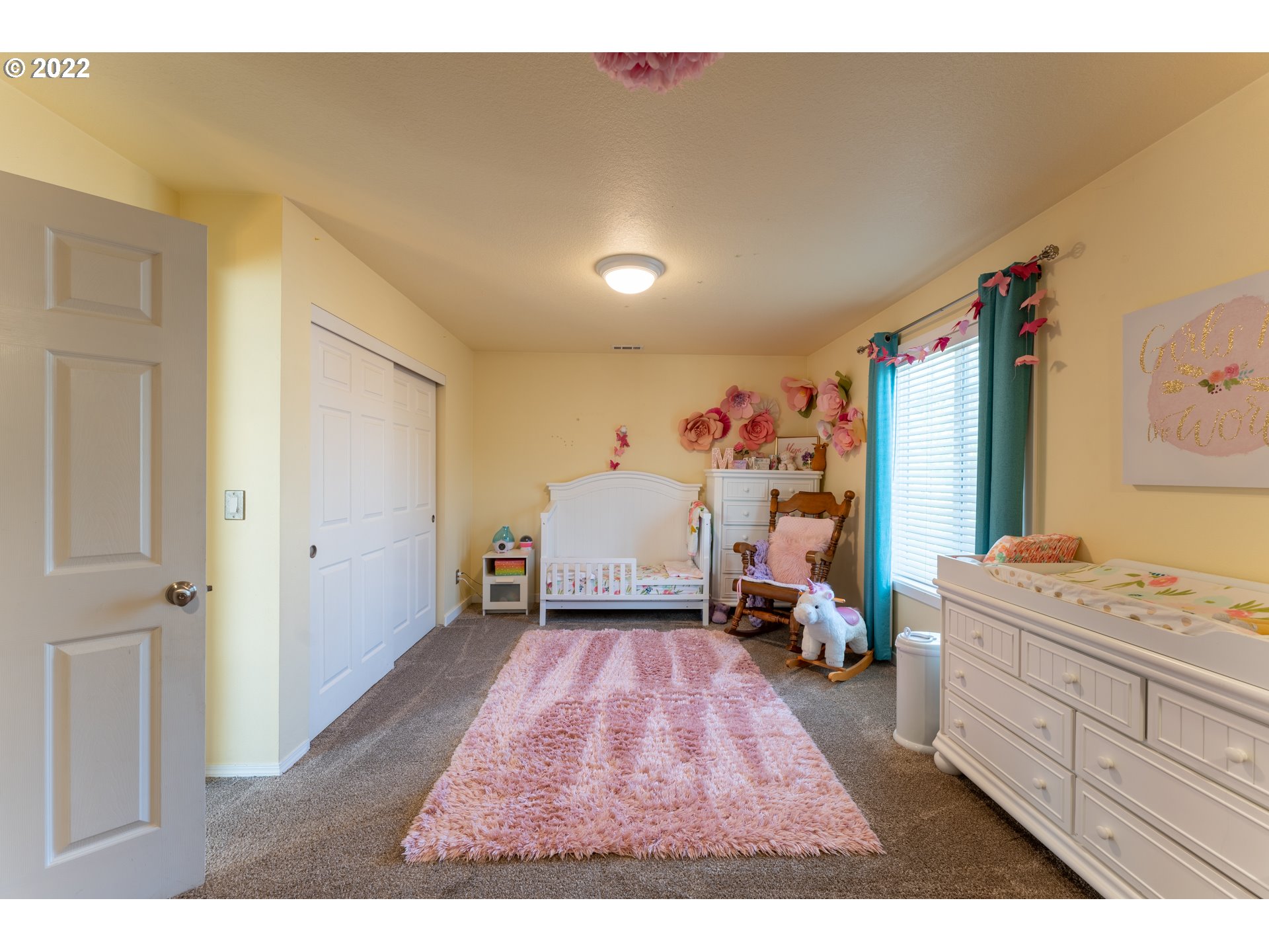10594 Southwest Windsor Court Tigard, OR 97223 - Photo 24 of 31 a very nice looking room with a bed