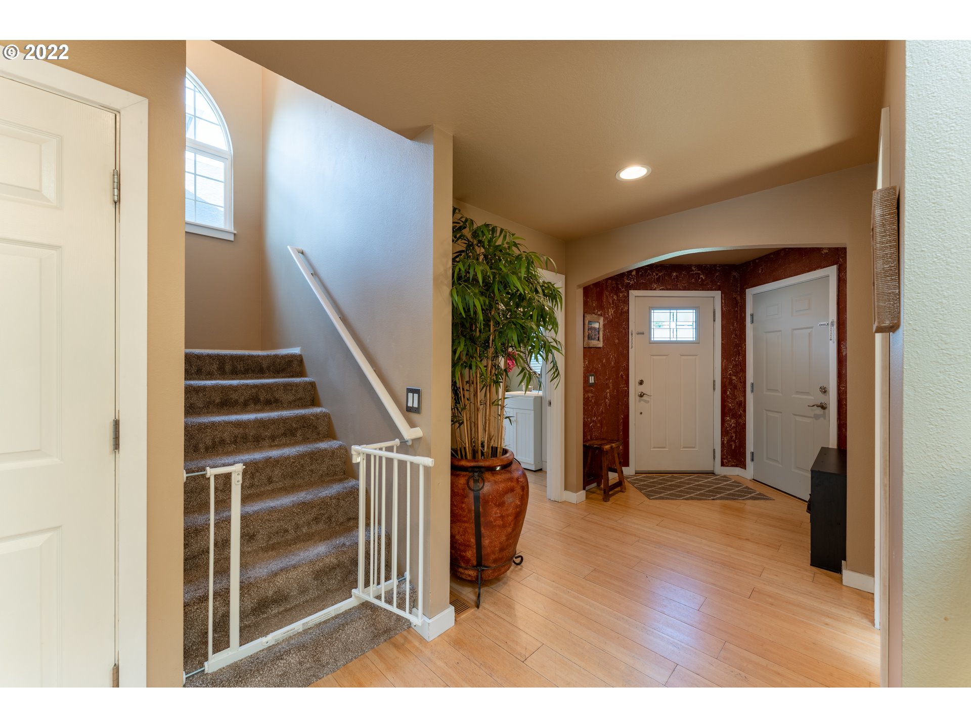 10594 Southwest Windsor Court Tigard, OR 97223 - Photo 3 of 31 a view of an entryway with wooden floor