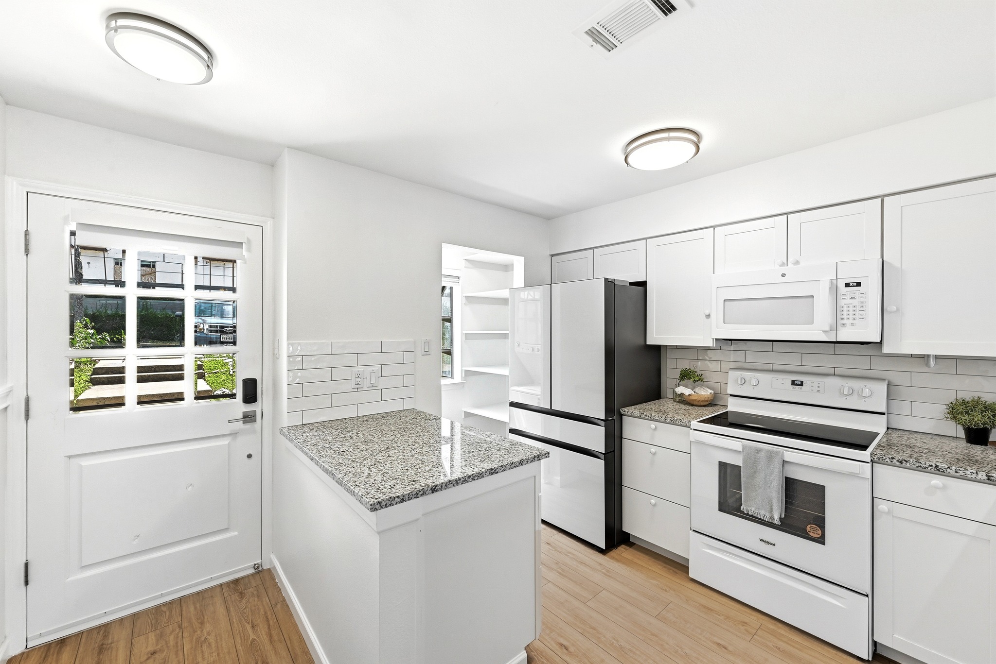 2215 Post Road, Unit 1026 Austin, TX 78704 - Photo 2 of 29 Kitchen updated 2022, refrigerator 2025, paint 2026